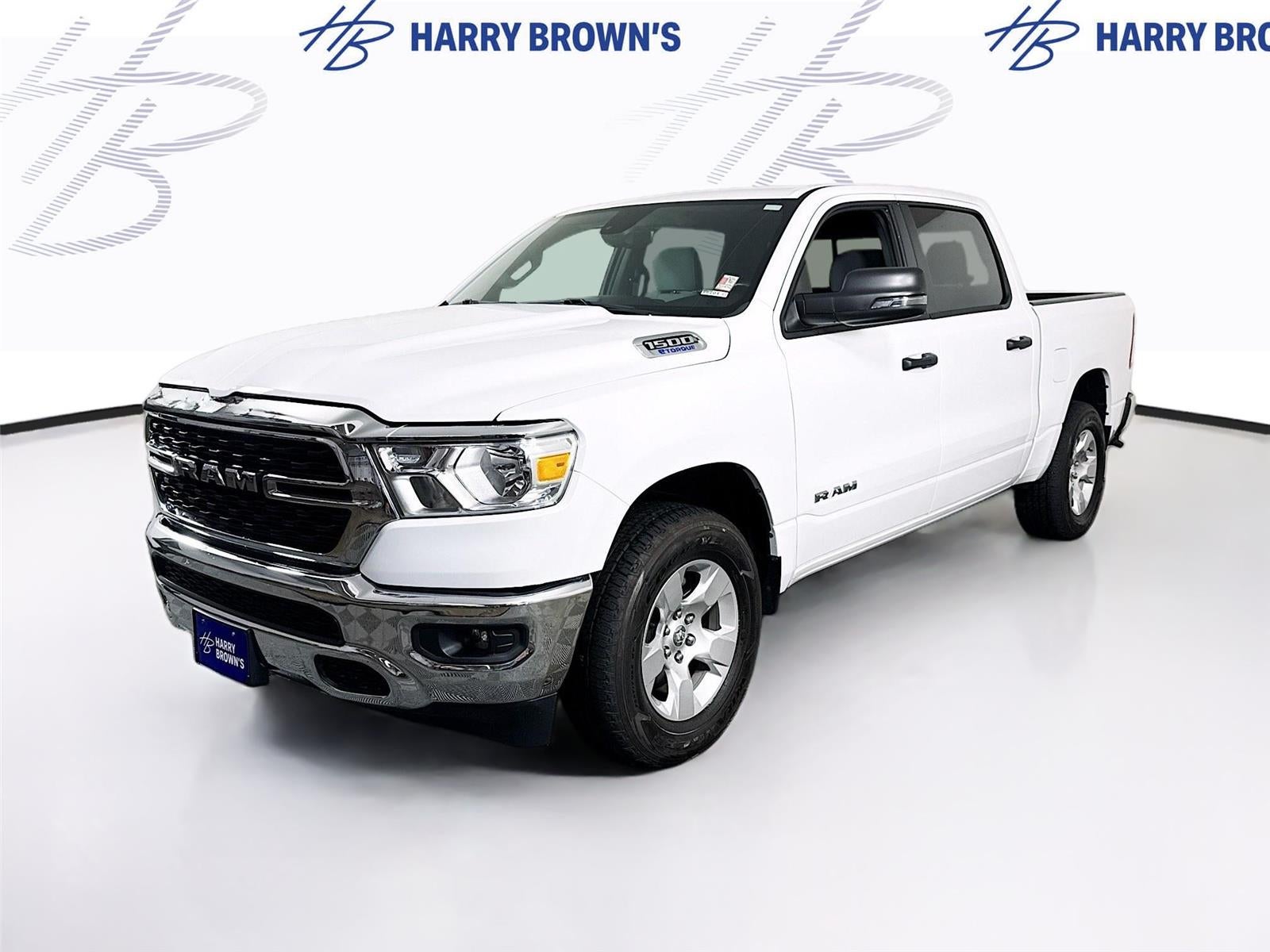 2023 RAM 1500 Big Horn in White — front three-quarter view