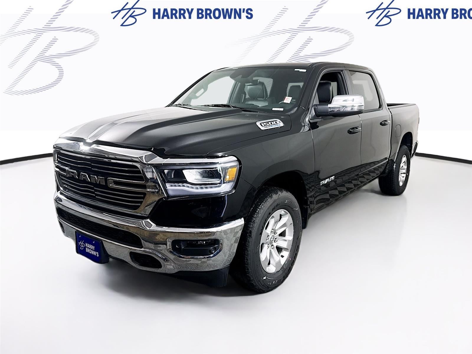 2024 RAM 1500 Laramie in Black — front three-quarter view