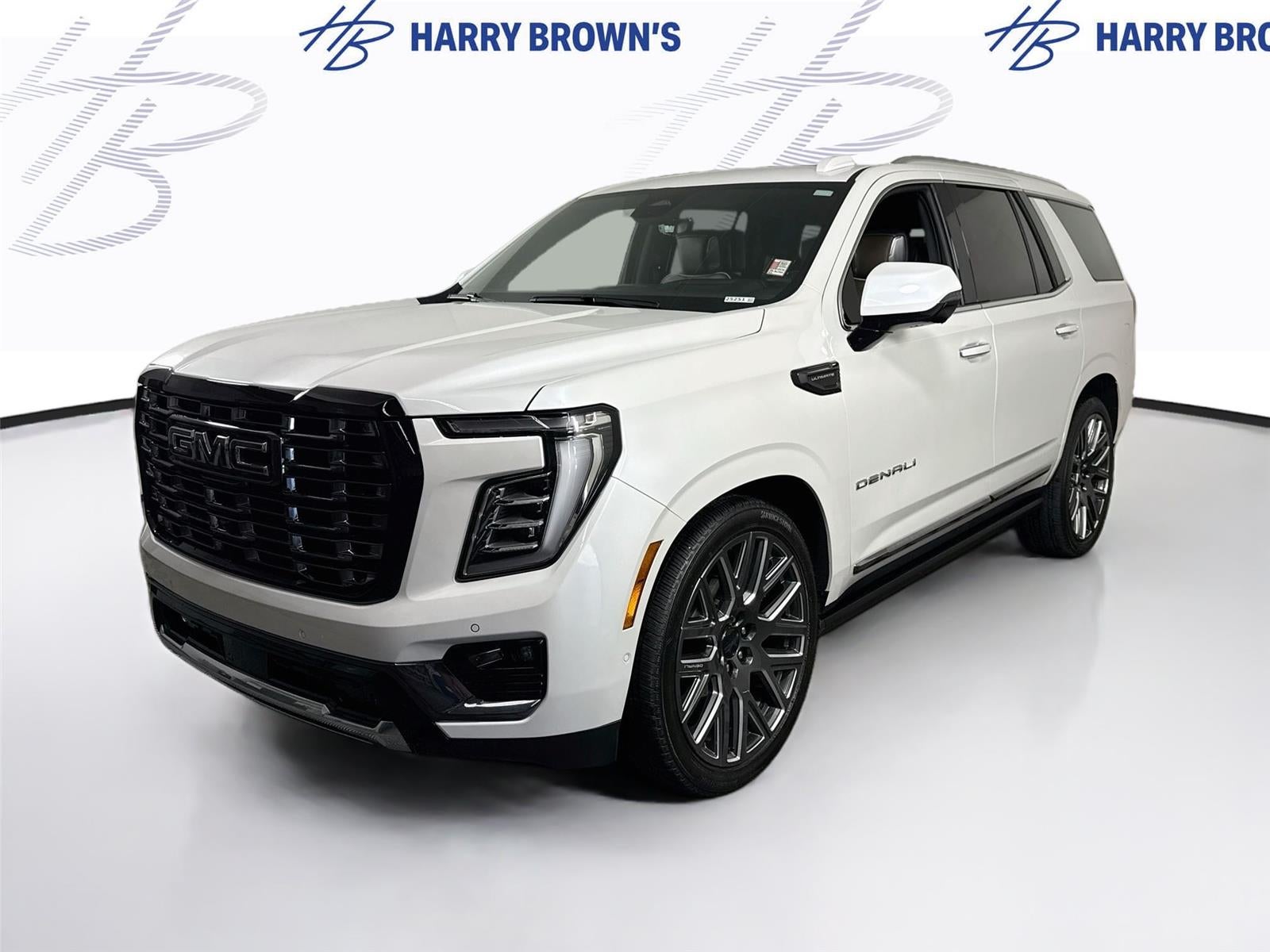2025 GMC Yukon Denali Ultimate in White Frost Tricoat — front three-quarter view