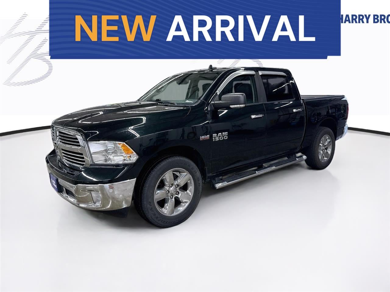 2016 RAM 1500 Big Horn in Black — front three-quarter view