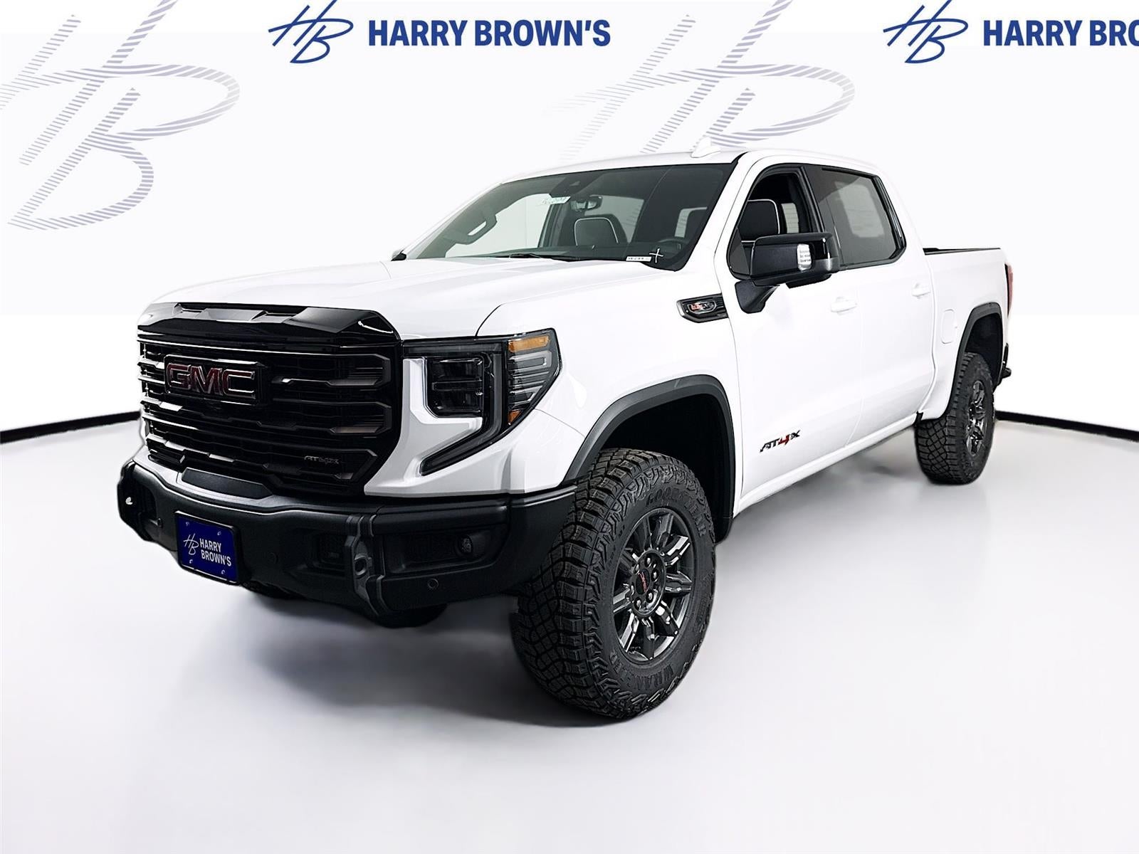2026 GMC Sierra 1500 AT4X in Summit White — front three-quarter view