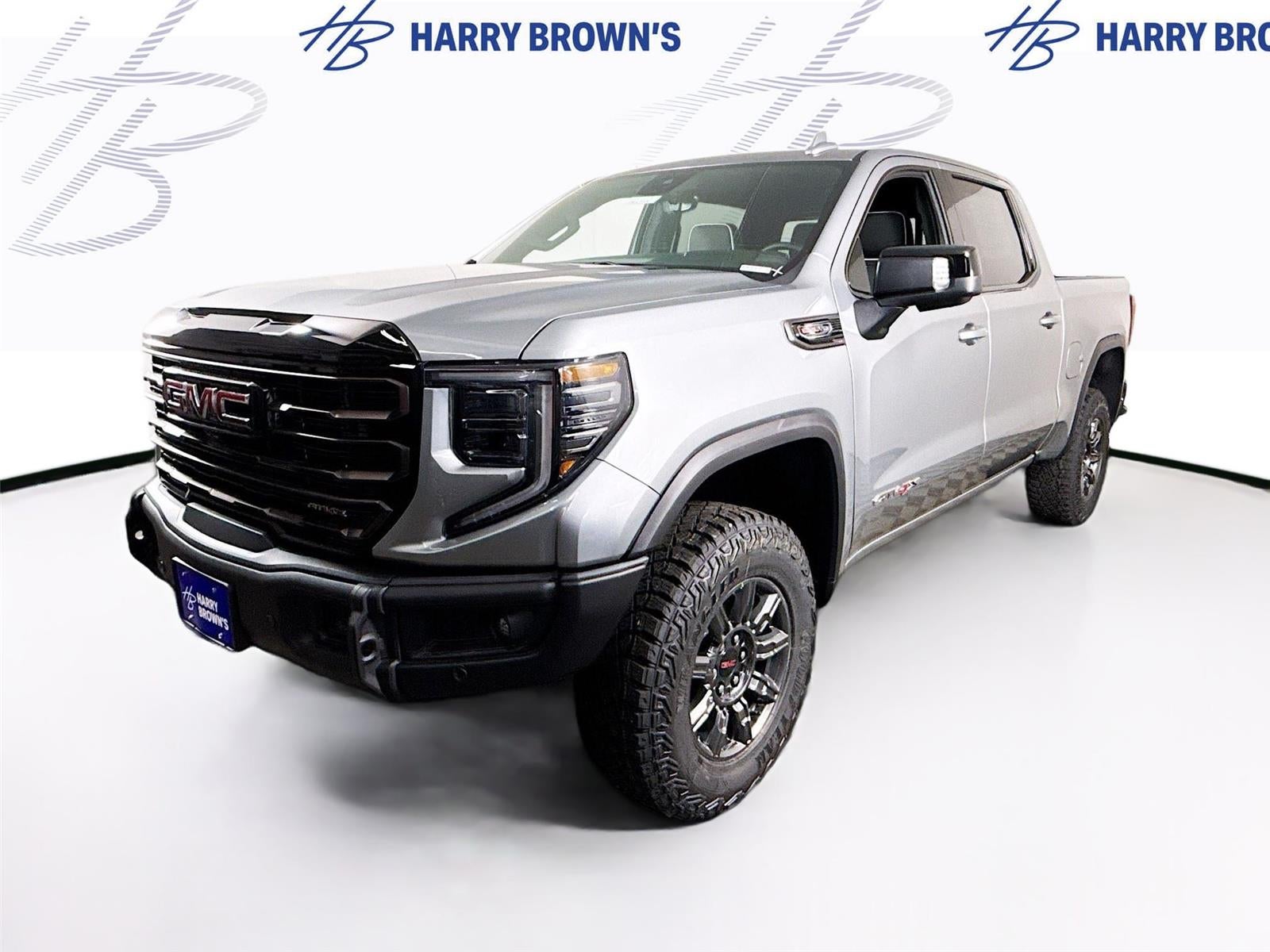 2026 GMC Sierra 1500 AT4X in Sterling Metallic — front three-quarter view