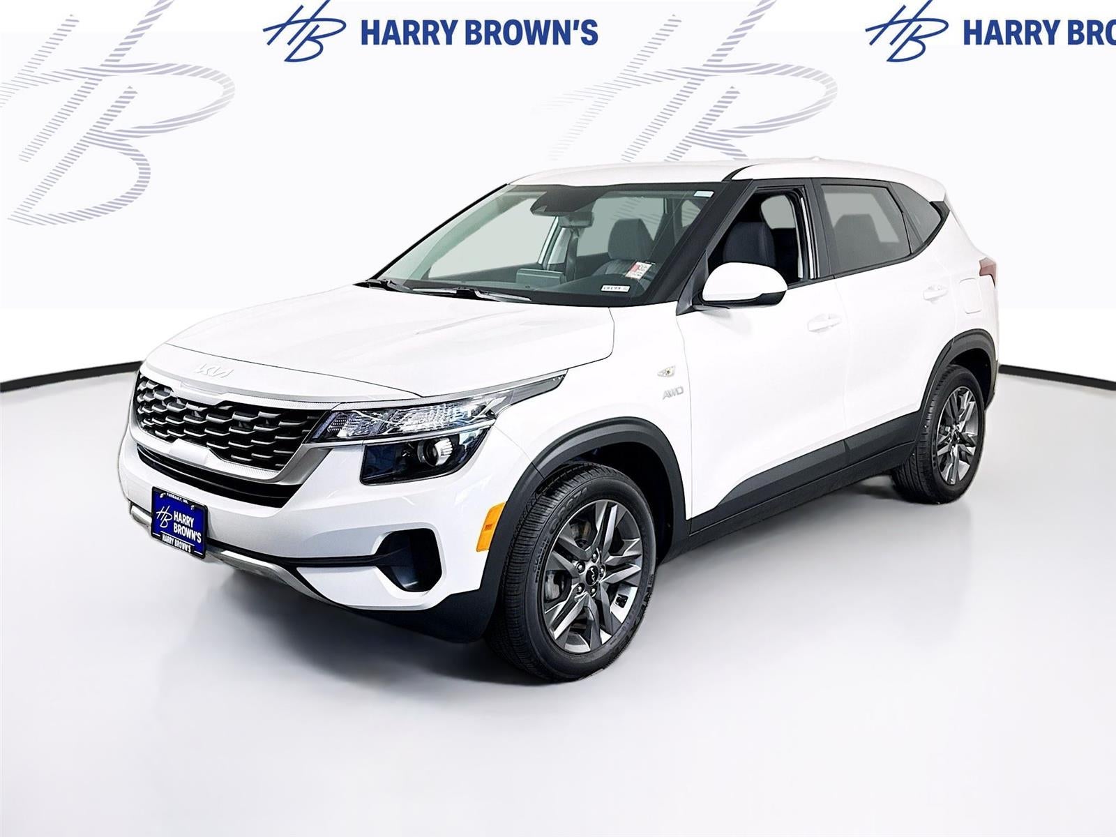 2023 Kia Seltos LX in White — front three-quarter view